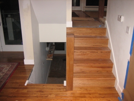 Wooden staircase, landing and floor